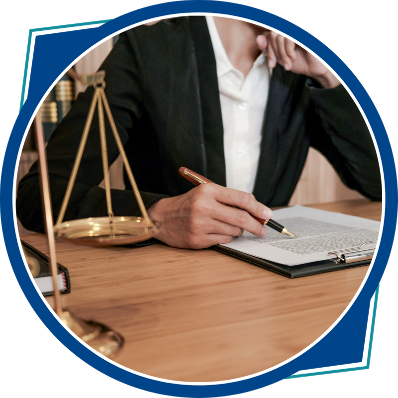 attorney writing, scales in foreground